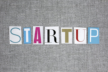 startup word on grey background