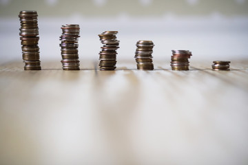 coins stacked in piles on the floor