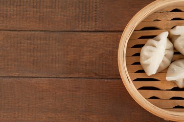 Fototapeta premium Dumplings in bamboo steamer