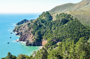 Central California coast with cliffs and blue ocean in Big Sur