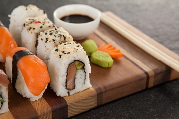 sushi set served with chopsticks and soy sauce