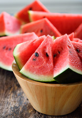 watermelon sliced on wooden background