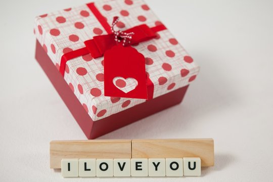 Gift and blocks displaying I love you message