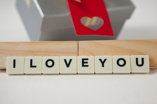 Gift and blocks displaying I love you message