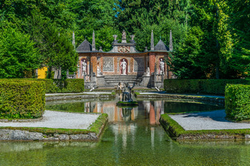 View of a trick fountain situated in a public park near the Hellbrunn Palace, Salzburg, Austria.