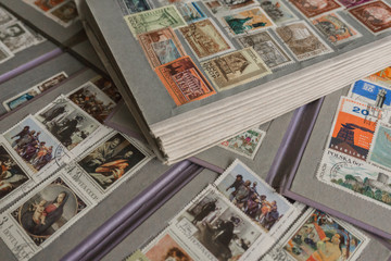 Fototapeta na wymiar stamp collecting. Philatelic. Different brands in the album for stamps