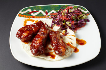 Pork ribs in Mexican style. Mexican food. Mexican cuisine.