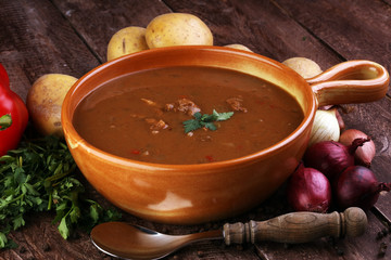 Tasty Hungarian beef goulash soup bograch close-up on the table and ingredient