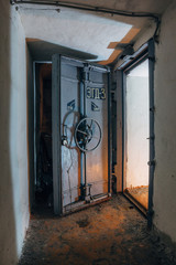 Opened hermetic door of an abandoned Soviet bomb shelter, an echo of the Cold War, Voronezh, Russia 