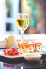 Sushi, a portion of Philadelphia sushi,philadelphia sushi tumblr,philadelphia roll. Ginger and a glass of wine. Japanese kitchen,Japanese cuisine,Japanese food. Japanese restaurant