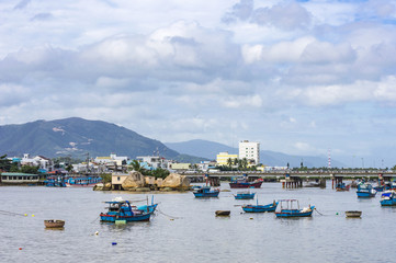 Fototapeta na wymiar Cai river and boats view in Nha Trang, Khanh Hoa Province, Vietnam