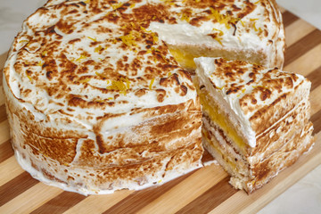 Homemade baked lemon tart cake with baked cream