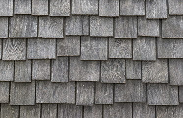 worn and weathered wooden shingles background texture