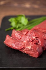 Beef steak on black slate plate 