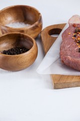 Sirloin chop, salt and black pepper