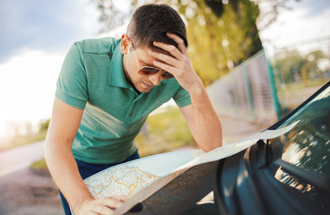 Problem with orientation on the road, bad navigation. Traveling and transportation concept