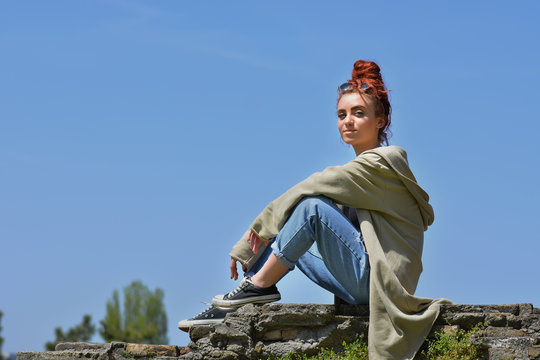 Beautiful Redhead With Blue Eyes Posing Outdoor