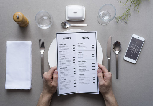 Restaurant Patron with Menu and Smartphone Mockup 1