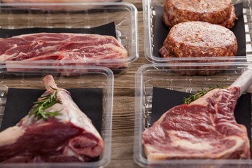 Varieties of meat in plastic boxes