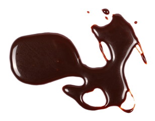 Hot melted chocolate pouring isolated on white background, with clipping path