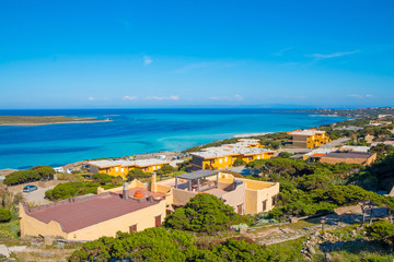 Naklejka na ściany i meble Beautiful turquoise blue mediterranean Pelosa beach near Stintino, Sardinia, Italy.