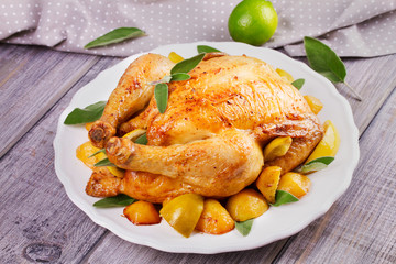 Chicken with Lemon, Lime and Potato Garnished with Sage