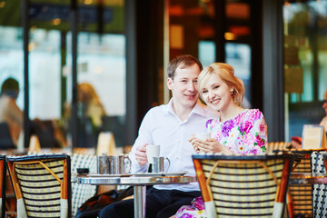 Romantic loving couple drinking coffee