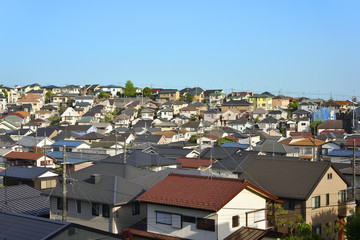 Fototapeta na wymiar Japan's residential area and blue sky