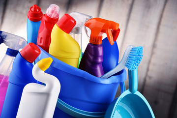 Variety of detergent bottles and chemical cleaning supplies