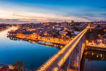 Fototapeta na wymiar Dom Luis I Bridge and Skyline of Porto Portugal at Dusk 