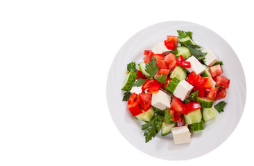 fresh vegetable salad with cheese. top view. isolated on white