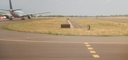 Fototapeta premium Airplane in airport runway