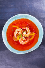 Shrimp Gazpacho. Spanish soup. Vegetable puree with prawns. View from above, top studio shot