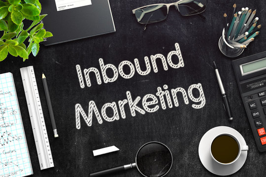 Inbound Marketing. Business Concept Handwritten on Black Chalkboard. Top View Composition with Chalkboard and Office Supplies. 3d Rendering. Toned Image.