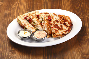 mixed quesadilla with sauce