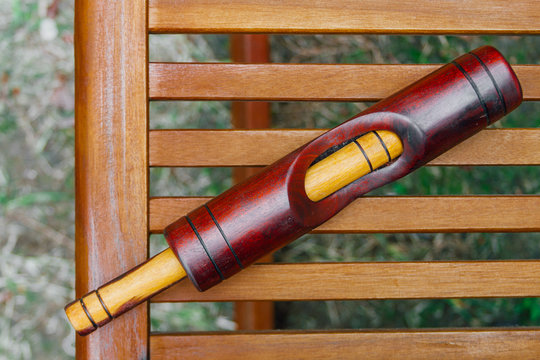 Cuban key on wooden grill with grass background