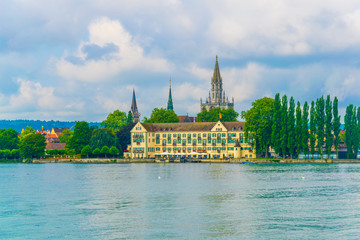 Cathedral of our lady and steigenberger hotel in konstanz standing over shore of the bodensee lake,...