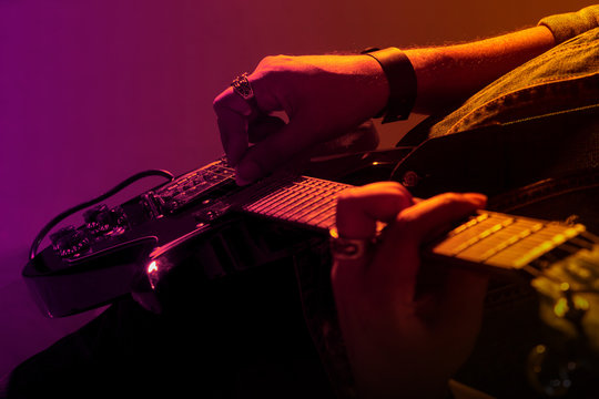 Electric guitar player on a stage