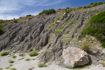 Fototapeta na wymiar Erosion pattern in soil on the slope of a hill in Crete, Greece