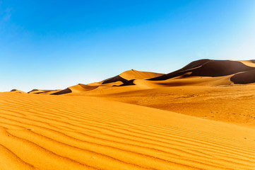 Naklejka na ściany i meble View of dunes in the dessert of Morocco by M'hamid