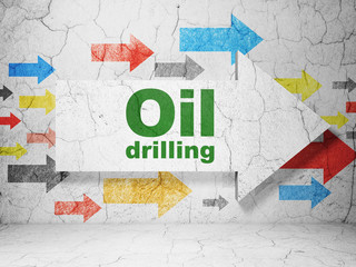 Manufacuring concept: arrow with Oil Drilling on grunge wall background