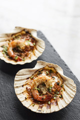 baked king prawns in spicy tomato and herb sauce