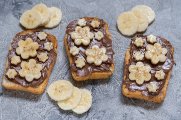 Toast bread with chocolate spread and banana