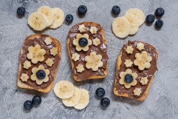 Toast bread with chocolate spread and banana