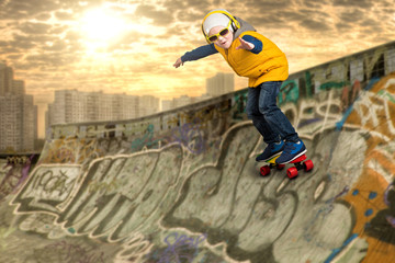 Boy doing tricks on a skateboard,stunts in the skate Park.The little boy in the style of Hip-Hop .	