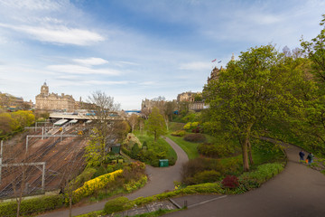 Fototapeta na wymiar Edinburgh Skyline- Princess Street Gardens, Waverly Train Station in sight