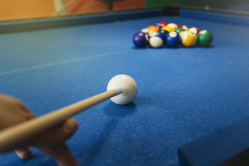 Billiard balls on blue table with billiard cues, Snooker, Pool game.