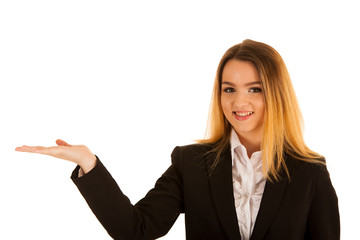 Obraz premium business woman holds hand over copy space for marketing a product