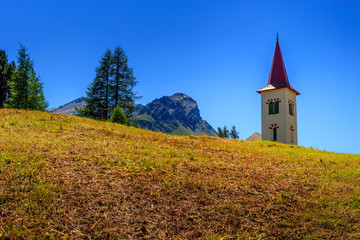 Maloya churchtower in summer