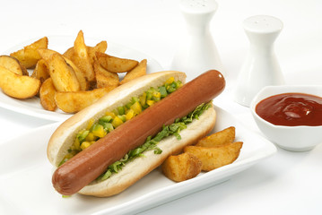 Chicken Jumbo Hotdog sandwich with fries & Ketchup on white plate 